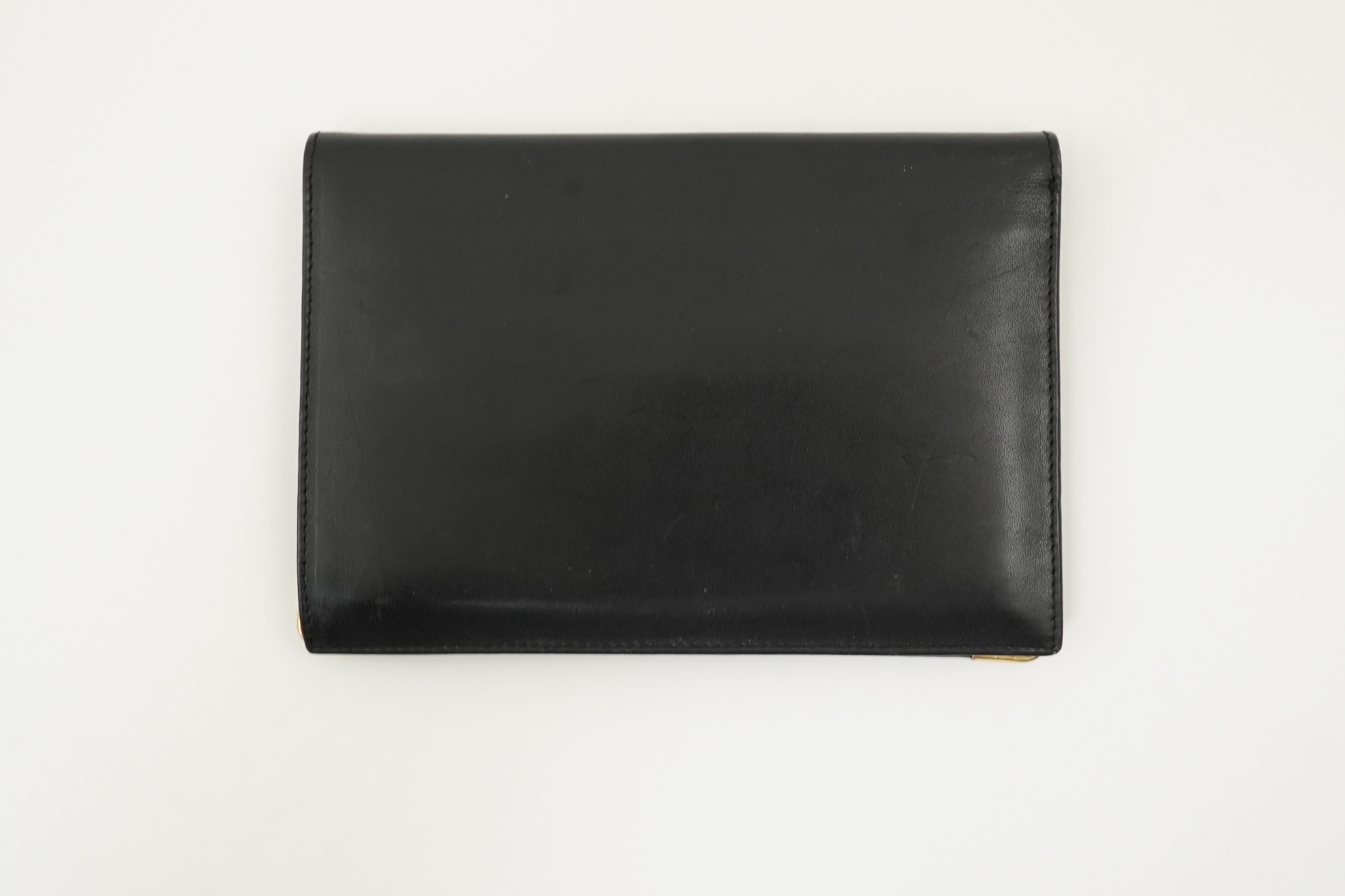 A gentleman's black Cartier wallet